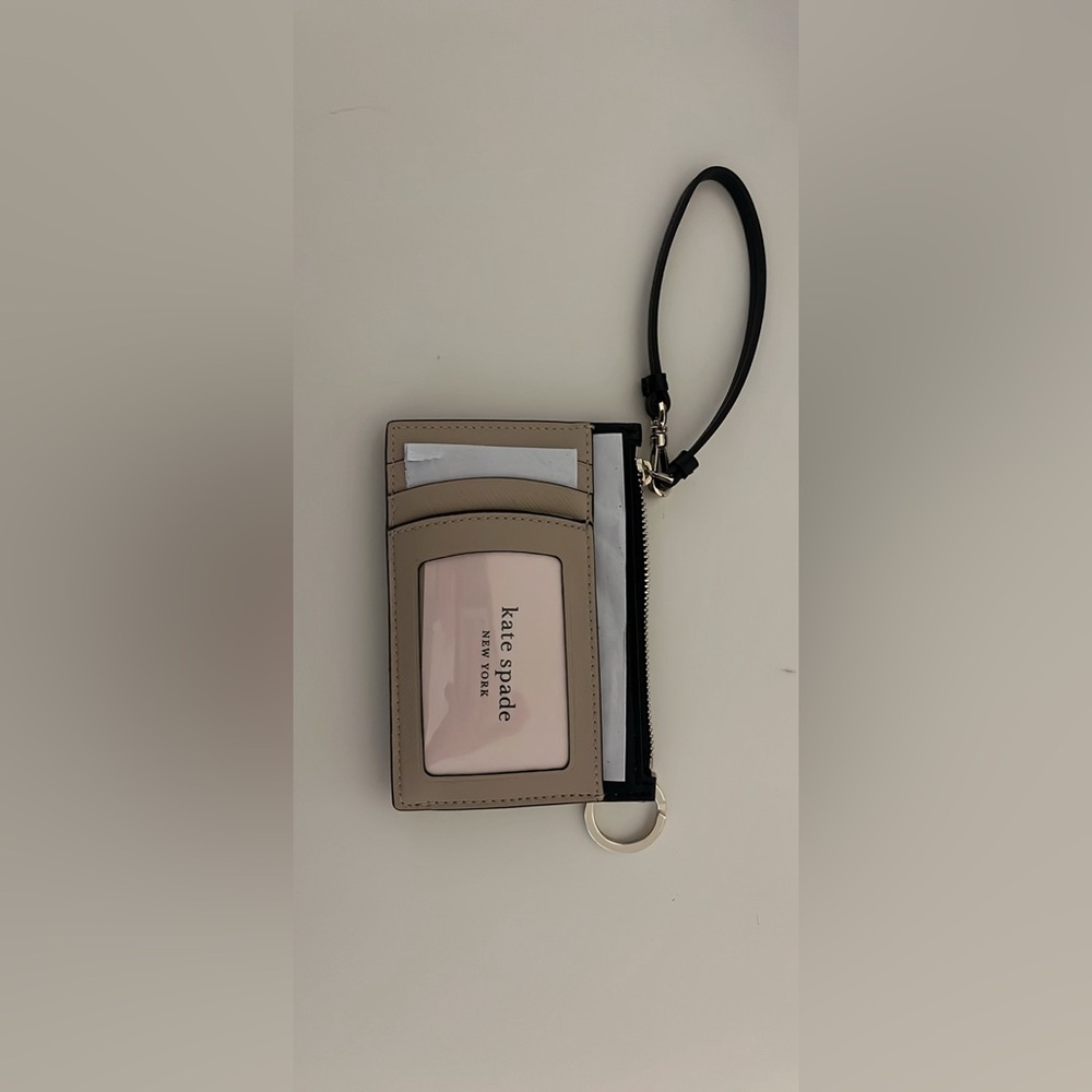 Kate Spade Wristlet. Brand new and never used. Comes with original tags.